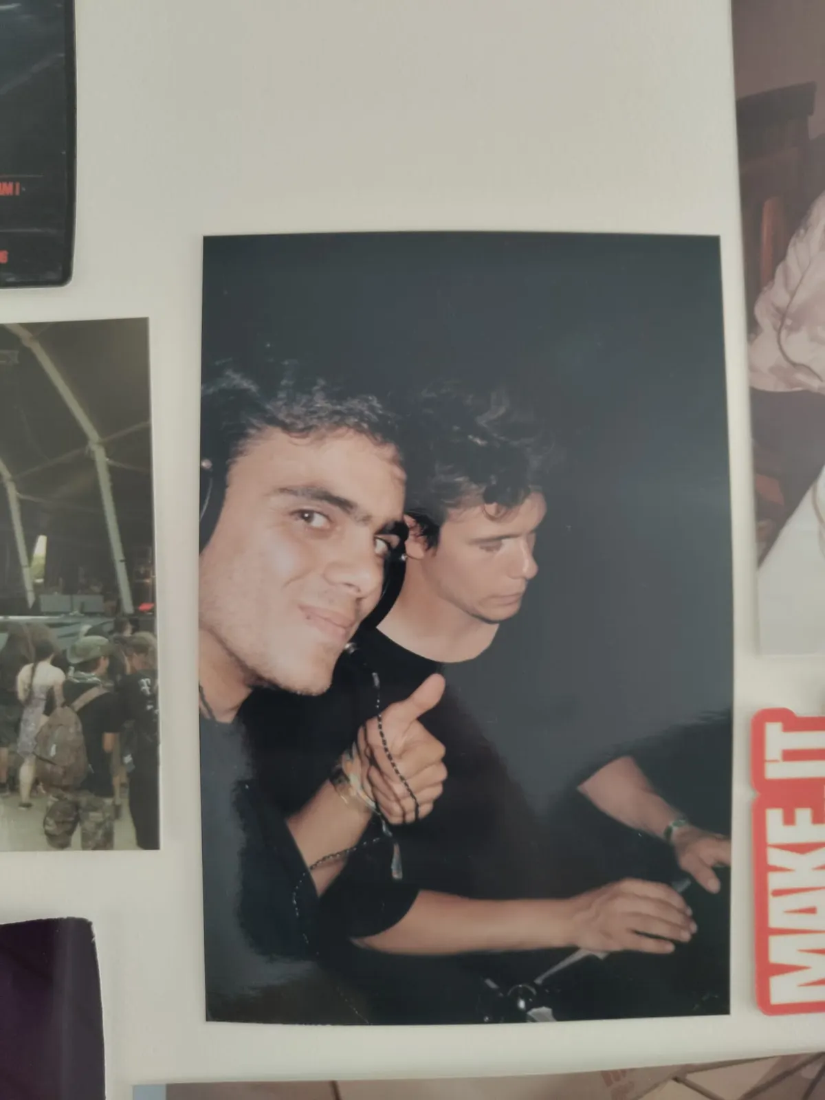 Framed candid photo of a Sadhäna band member giving a thumbs up backstage